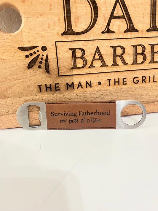 "Surviving Fatherhood One Beer at a Time" Handheld Bottle Opener